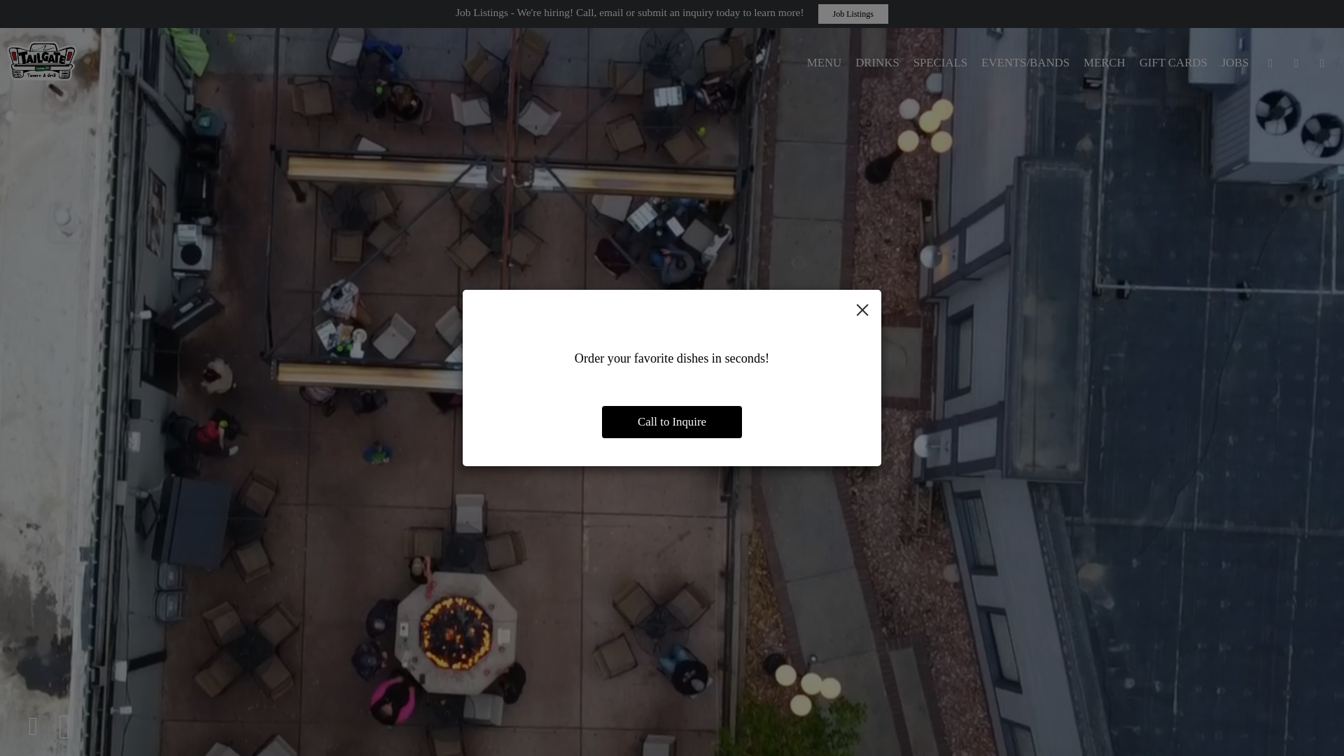 website screenshot of https://tailgatetavern.com/