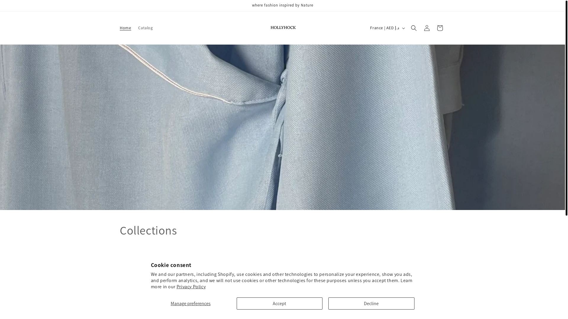 website screenshot of https://hollyhockae.com/