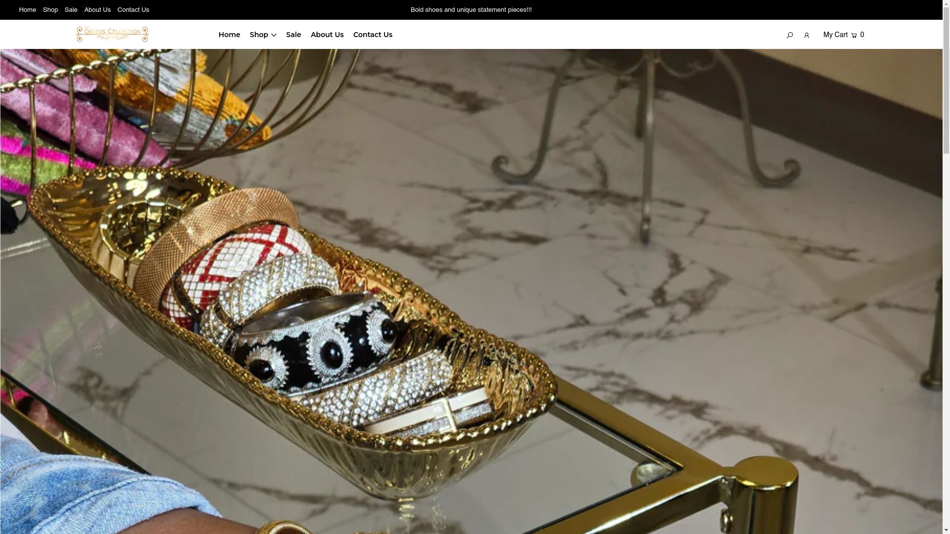website screenshot of https://thegenesiscollectionshop.com/